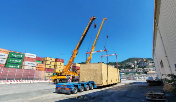 Cranes lifting cargo at port