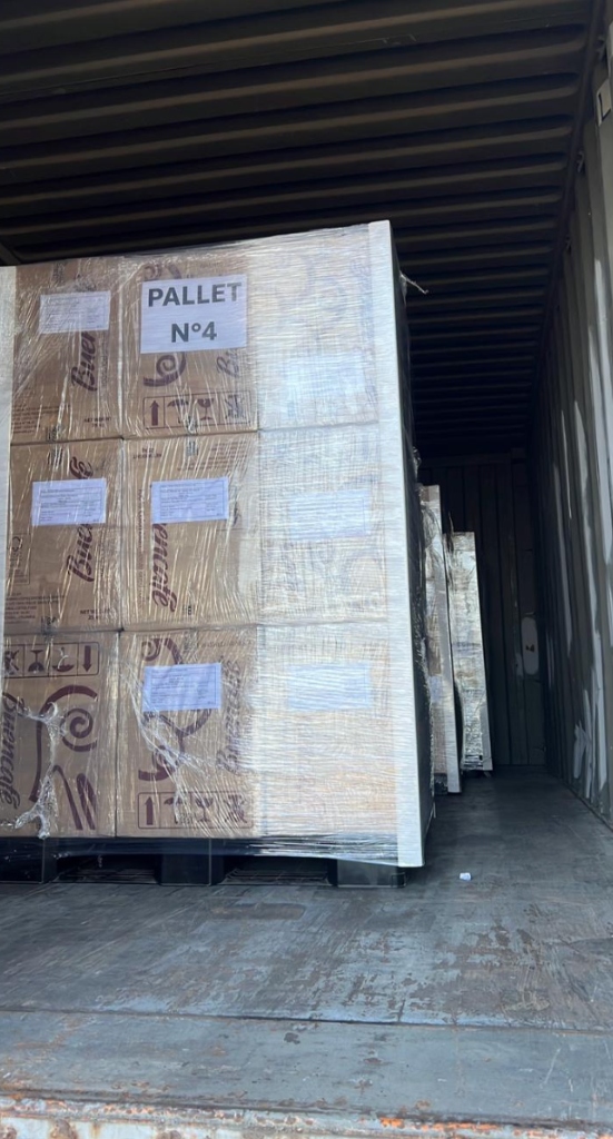 Wrapped pallet inside container
