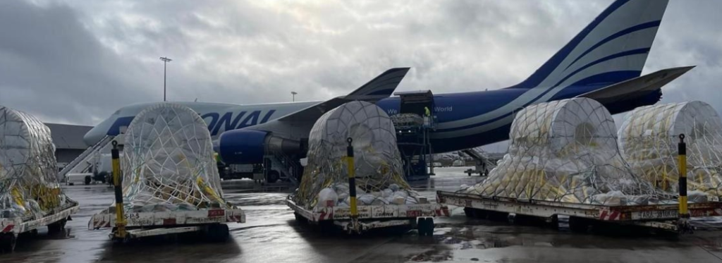 National Air Cargo freighter aircraft loading ULD pallets on tarmac
