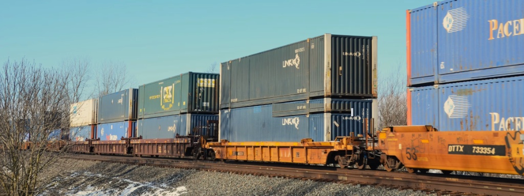 Intermodal container freight train on rail line