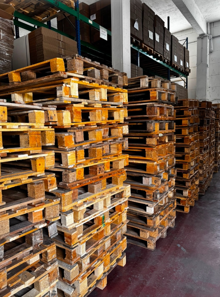 High-stack EUR wooden pallets in bonded warehouse depot